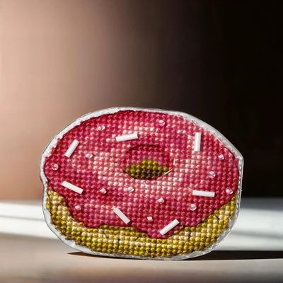 Pink Donut by Wonderland Crafts Double-Sided Cross stitch kit on a plastic base with magnet