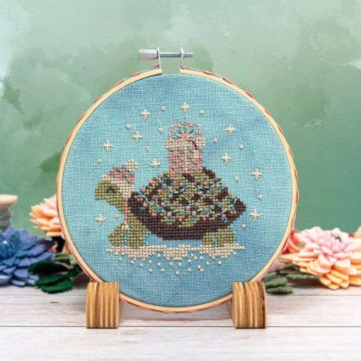 Turtle Tidings Ornament by Counting Puddles 2024 Designer Lindsey Whitney. Winter Counted cross stitch pattern