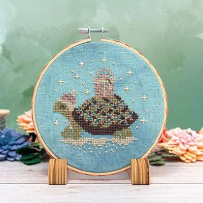 Turtle Tidings Ornament by Counting Puddles 2024 Designer Lindsey Whitney. Winter Counted cross stitch pattern