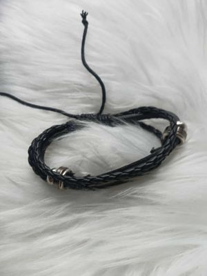 Męska bransoleta rzemykowa z piórem