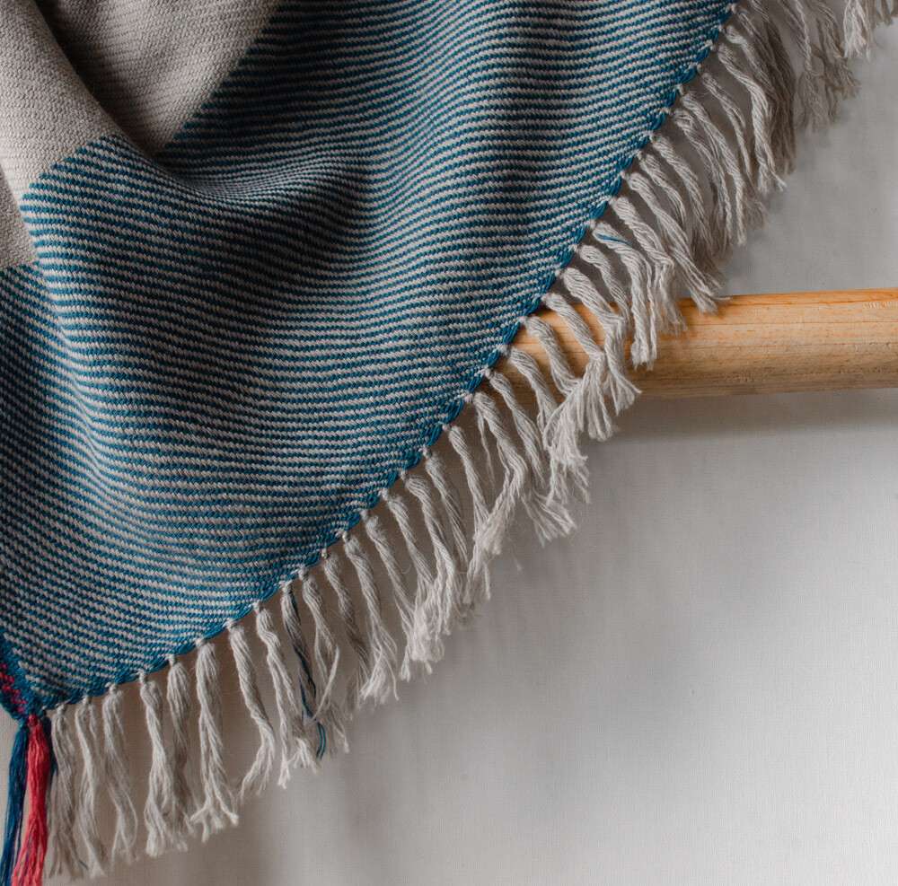 Hand-woven woollen stole dyed with Indigo, shellac and harada