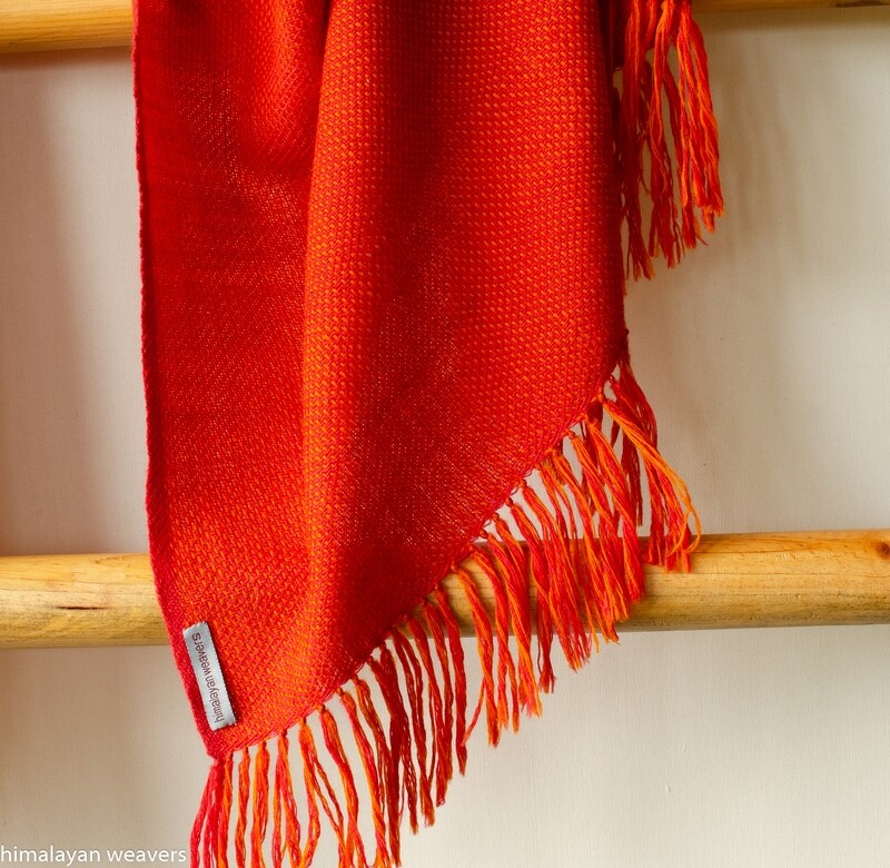 Hand-woven woollen stole dyed with madder roots and tesu flowers