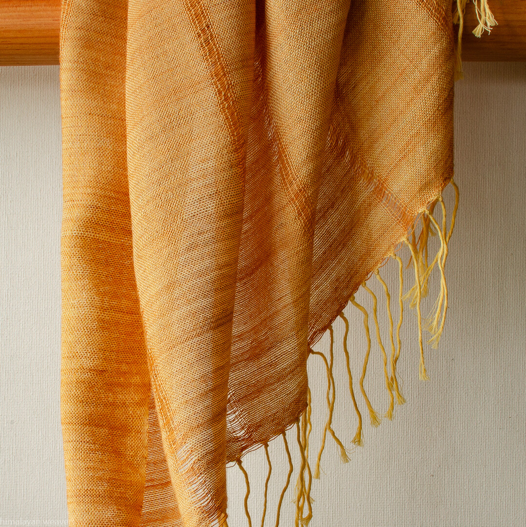 Hand-woven cotton and eri-silk stole dyed with tesu flowers