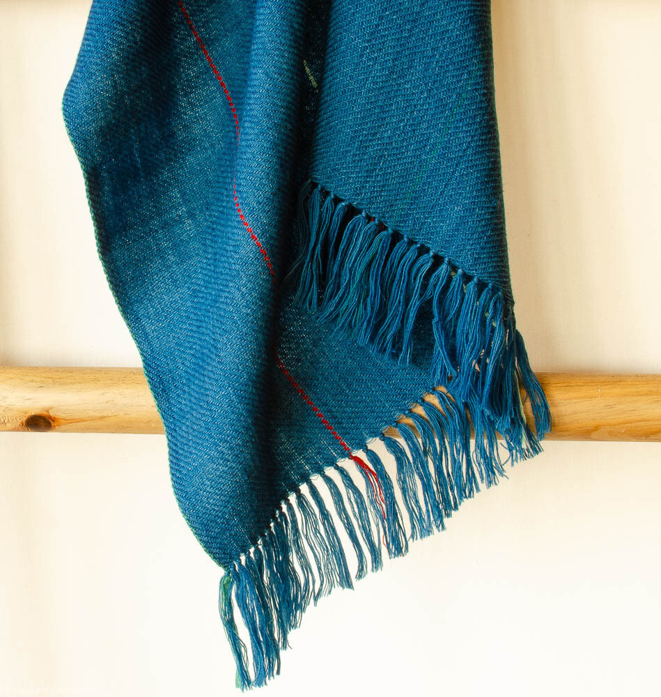Hand-woven woolen stole dyed with madder, indigo, tea and tesu flowers