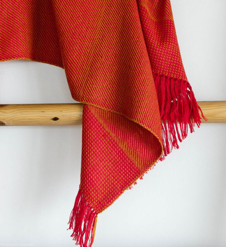 Hand-woven woolen stole dyed with madder and tesu flowers