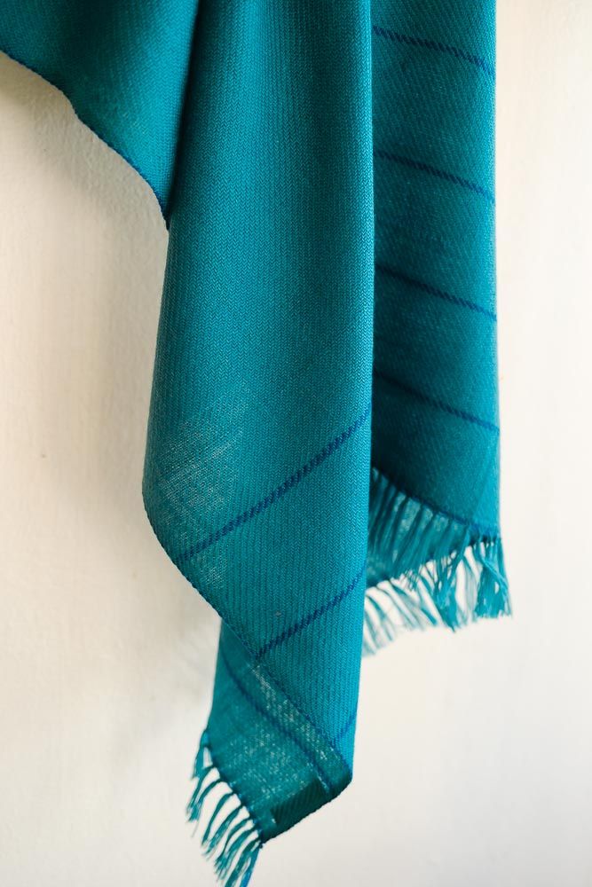 Hand-woven Woolen Stole Coloured With Indigo and Tesu Flowers Hand-woven Woolen Stole Coloured With Indigo and Tesu Flowers