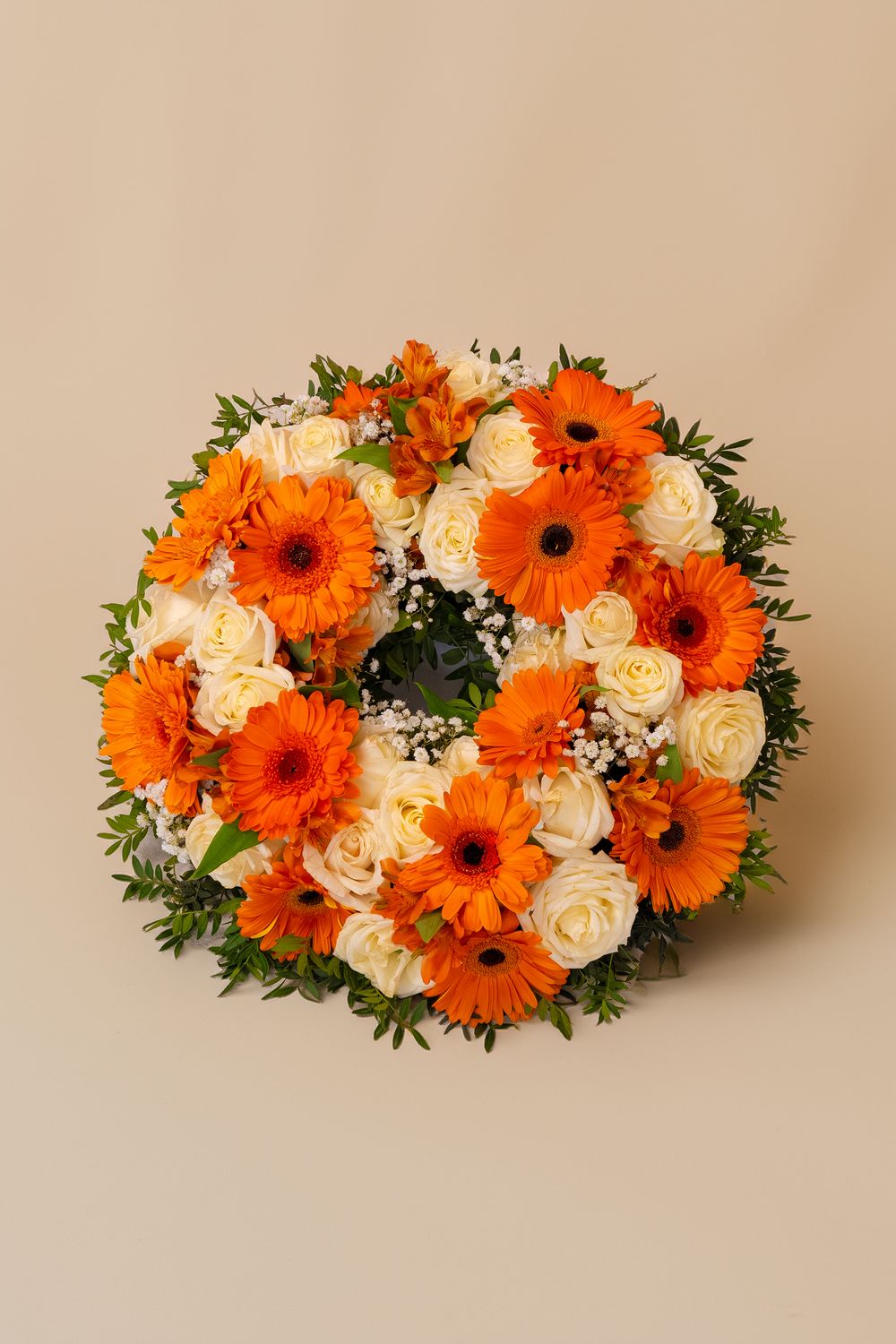 Couronne de deuil orangée — Hommage éclatant