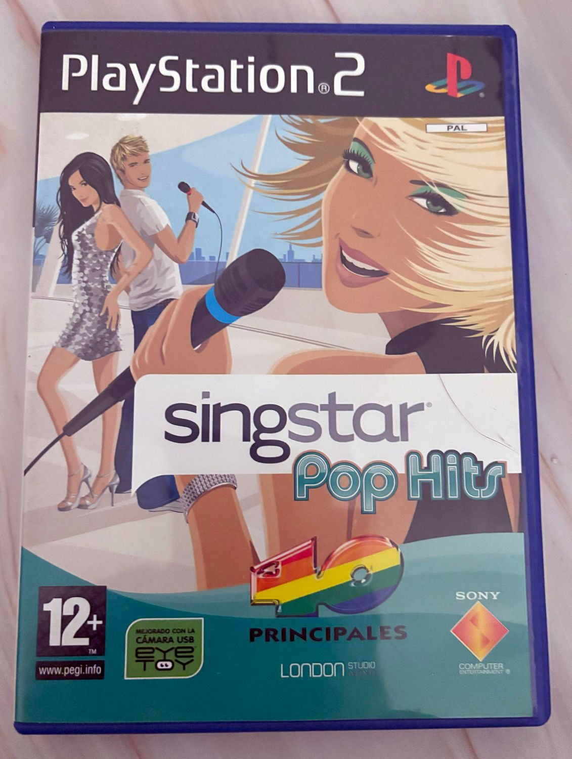 🎤 SingStar Pop Hits – 40 Principales – PS2