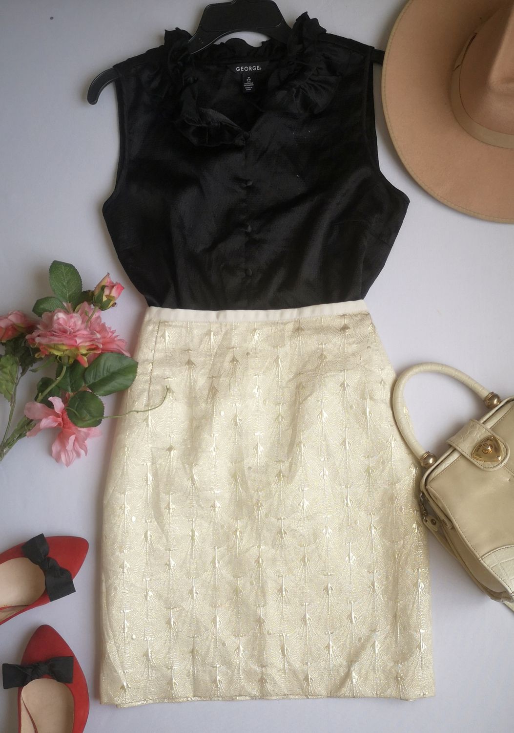 BLUSA CUELLO CERRADO CON FALDA