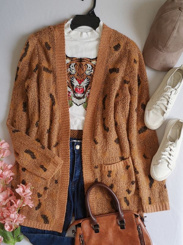 CARDIGAN CON BOLSAS