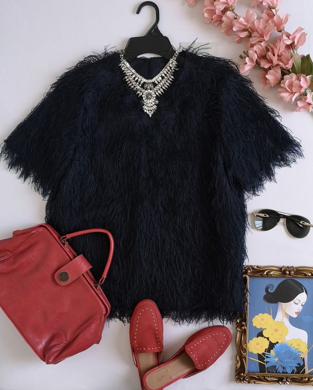 BLUSA CON FLECOS NUEVA