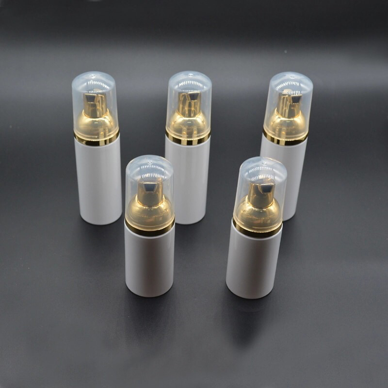 Empty white liquid soap Foam bottle with golden foamer pump