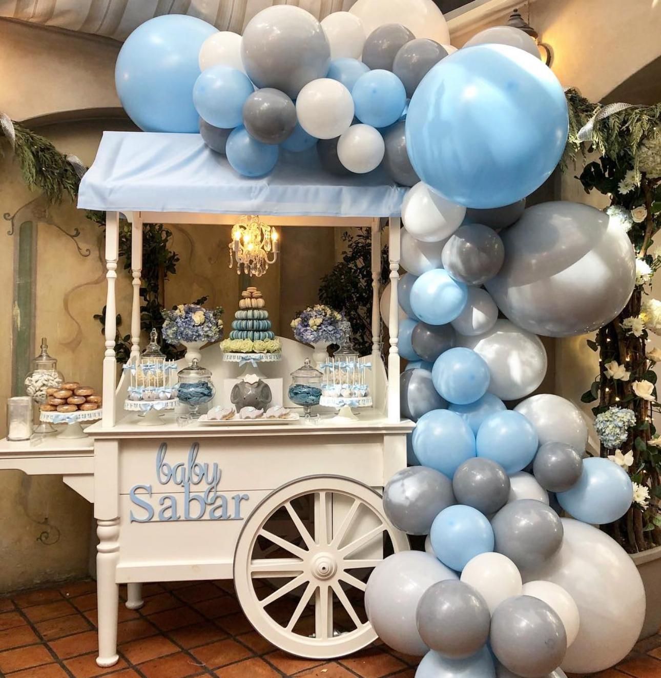 Classic White and Blue Candy Cart with Fresh Decor