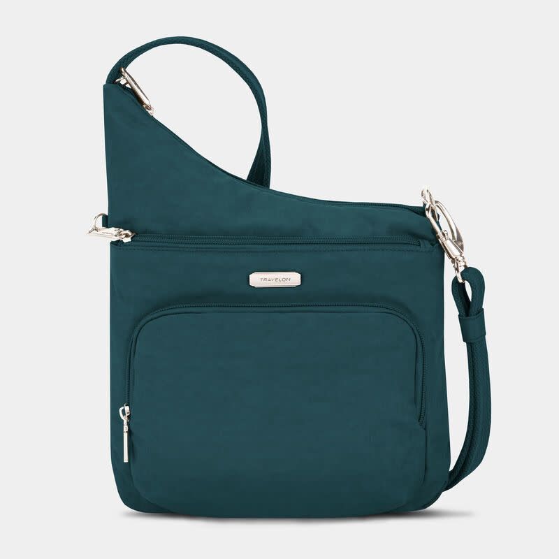 ANTI-THEFT ESSENTIALS NORTH/SOUTH ASSYMMETRIC CROSSBODY (43487