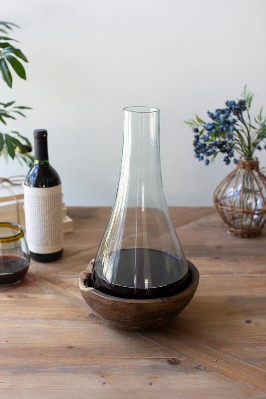Glass Bottle on Teakwood Base