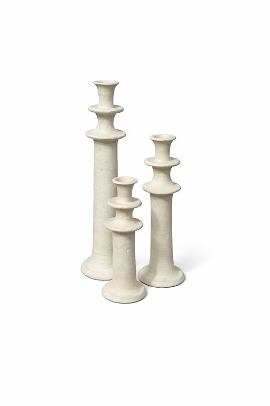 Set van 3 stenen kandelaars