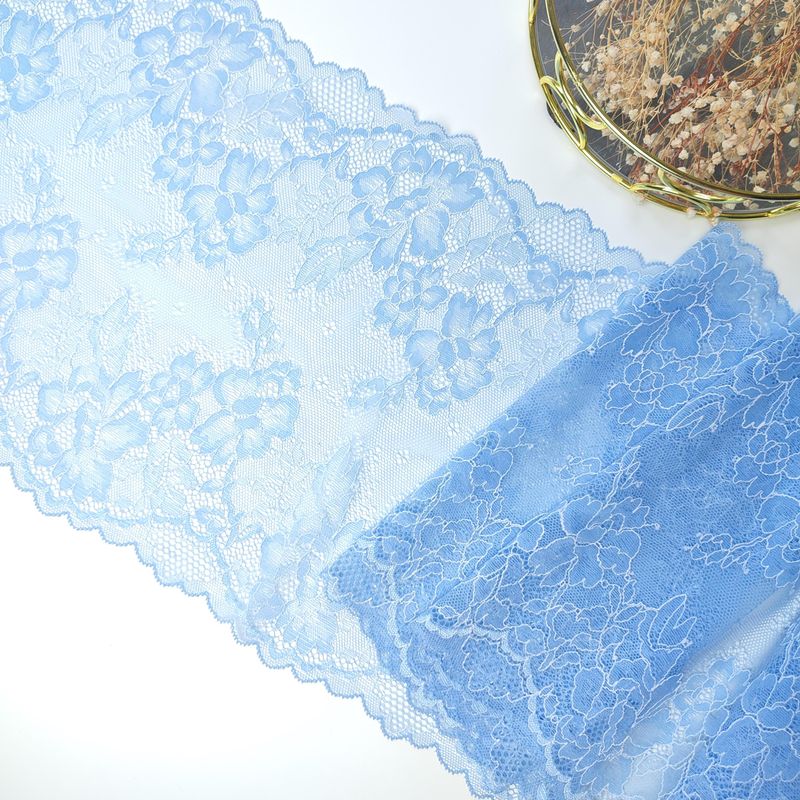Light blue stretch lace with floral pattern for lingerie sewing


