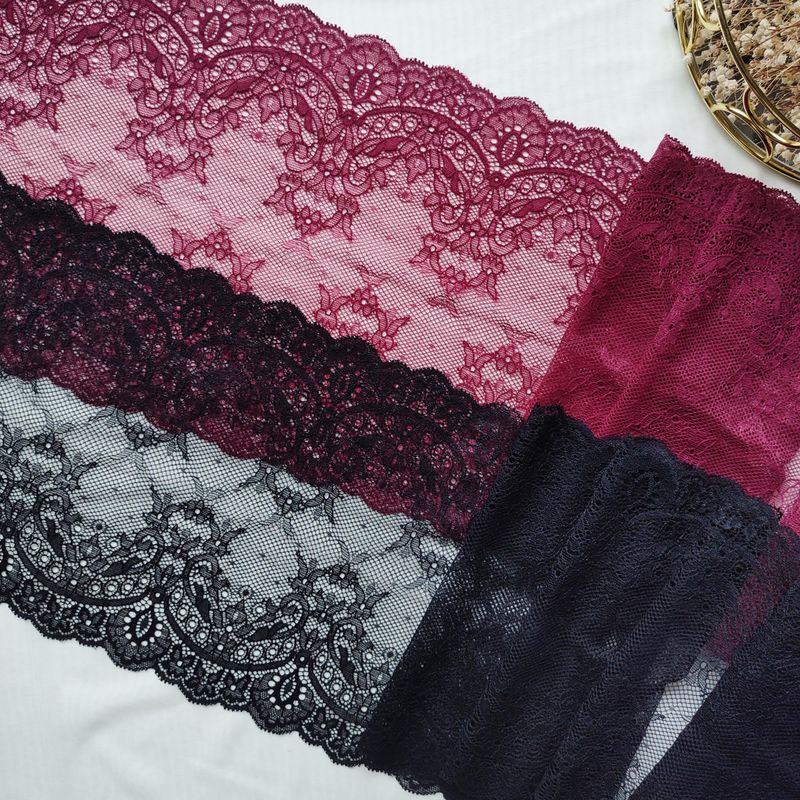 stretch lace trims in burgundy and black with floral scalloped patterns