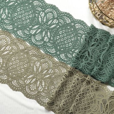 corded elastic laces in olive and forest green with floral patterns