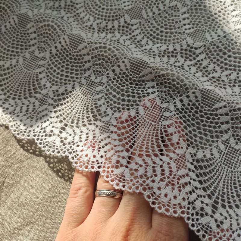 elastic lace trims in white, ivory, and beige peach with floral designs
