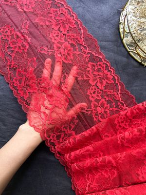 Bright red stretch lace with floral design, 23 cm wide

