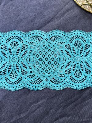 Pastel turquoise textured stretch lace for lingerie sewing

