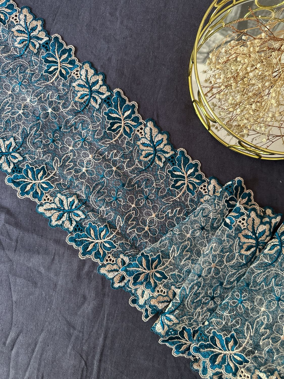 Beige and teal lace trim with floral embroidery

