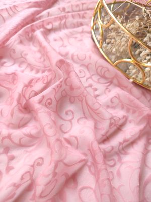 Pink stretch mesh with swirling pattern