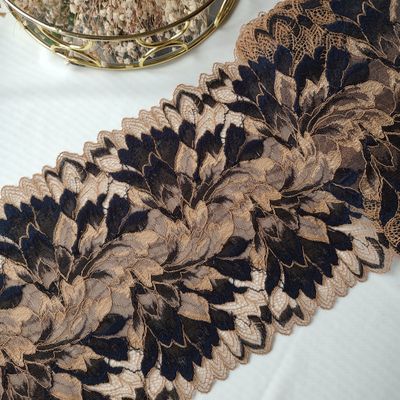 Tanned skin and blue stretch lace with floral pattern, 20 cm wide, for lingerie sewing.
