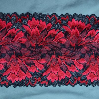 Red and black stretch lace with floral pattern, 20 cm wide, for lingerie sewing.