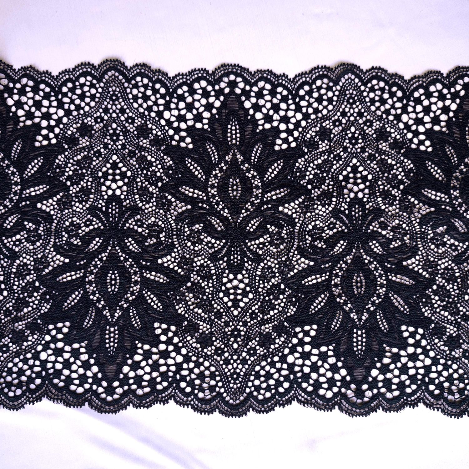 Black stretch lace trim 23 cm wide with ornamental pattern for lingerie sewing