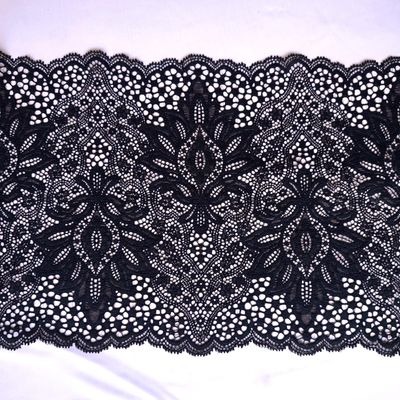Black stretch lace trim 23 cm wide with ornamental pattern for lingerie sewing