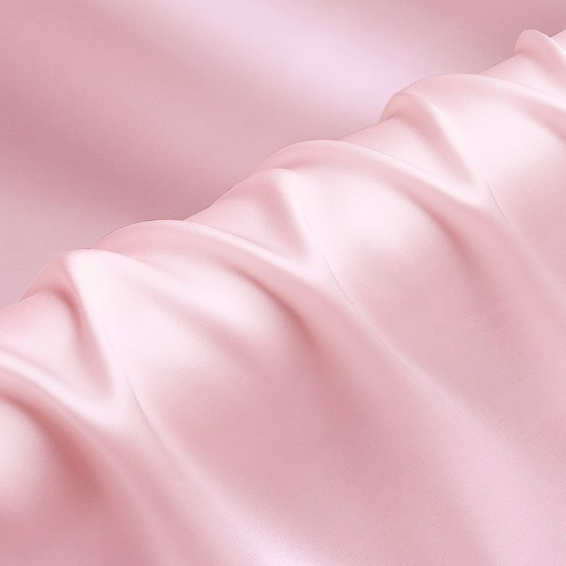Pink stretch satin fabric with glossy finish