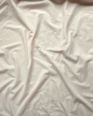 Soft cream stretch microfiber fabric — smooth matte surface