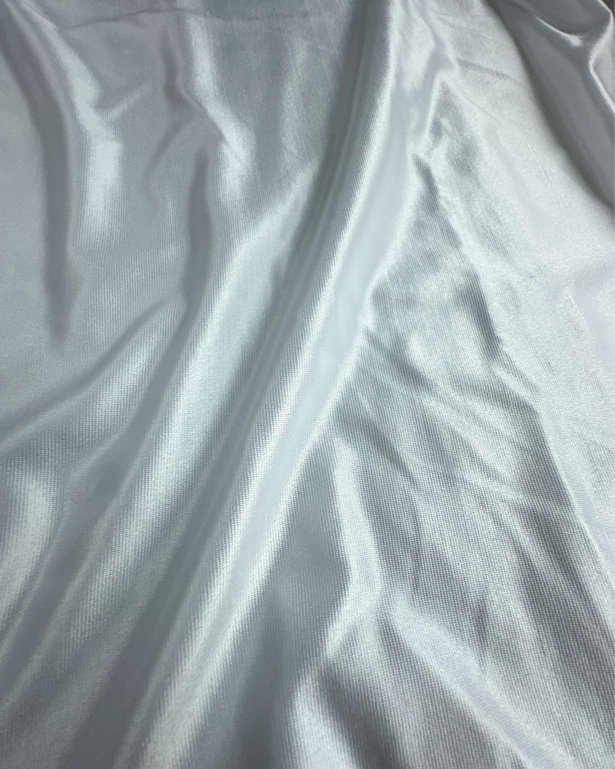 Warm white glossy 2-way stretch microfiber for lingerie sewing