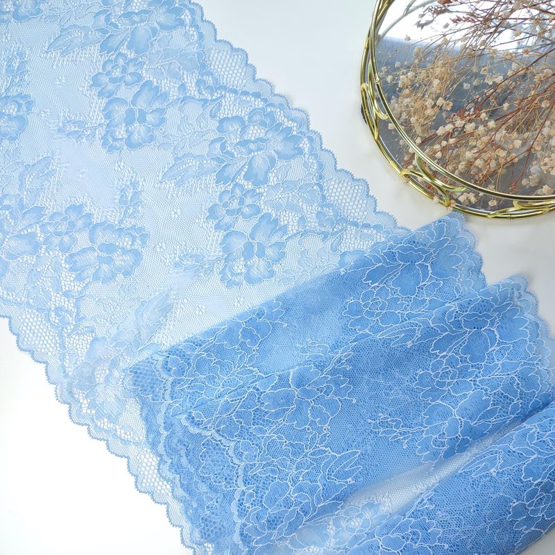 Light blue stretch lace with floral pattern for lingerie sewing

