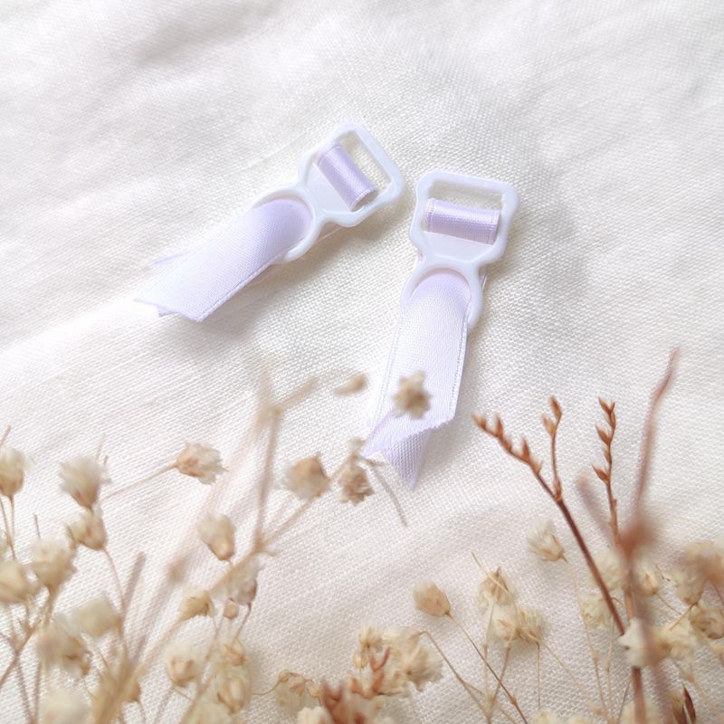 Pair of 10mm plastic garter clips for lingerie sewing in multiple colors
