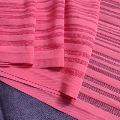 Bright coral striped lace for lingerie and crafts