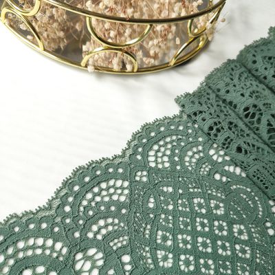 corded elastic laces in olive and forest green with floral patterns