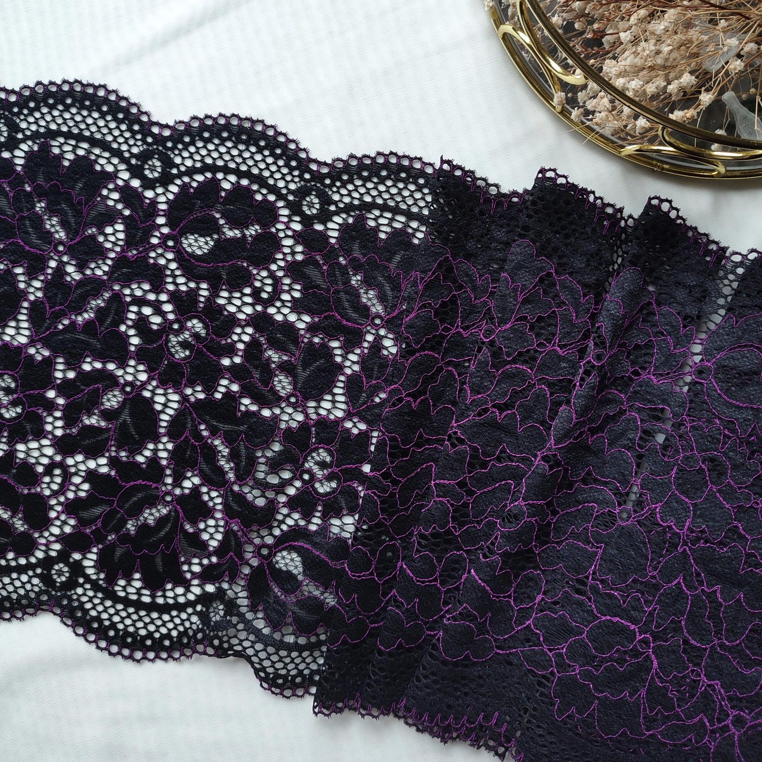 Black stretch lace with purple cord embroidery

