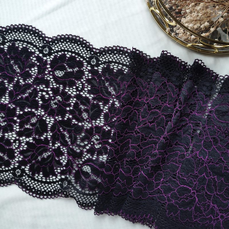 Black stretch lace with purple cord embroidery

