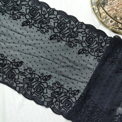 Black luxury stretch lace with glitter and floral flock design

