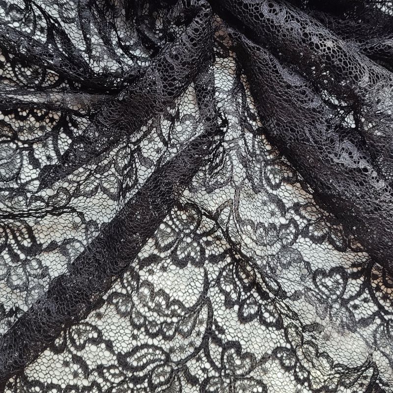Tessuto pizzo guipure nero a motivo floreale, largo 145cm (57.1")