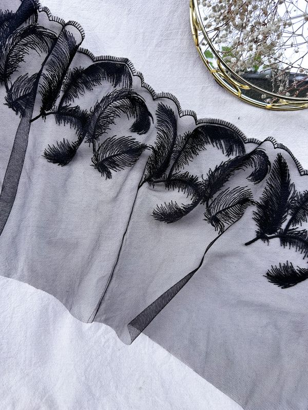 Black feather embroidery lace on fine mesh, 23 cm wide

