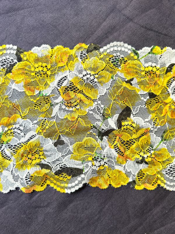 Yellow floral stretch lace on ecru base, 18 cm wide

