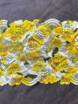 Yellow floral stretch lace on ecru base, 18 cm wide

