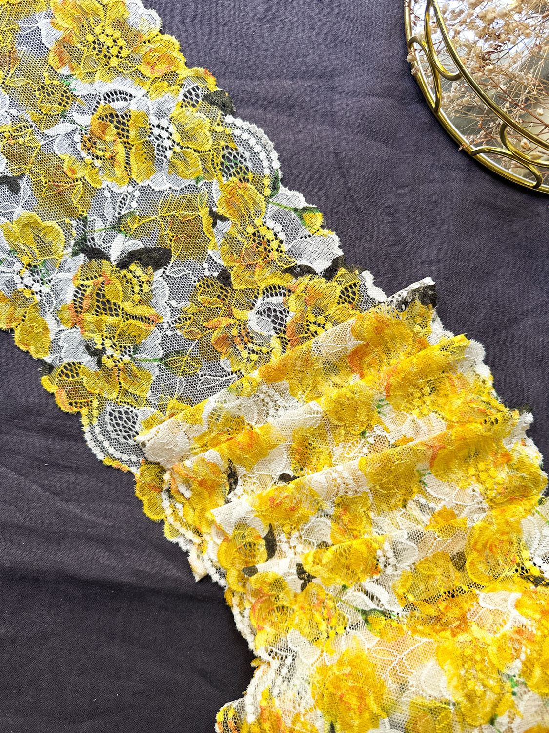 Yellow floral stretch lace on ecru base, 18 cm wide

