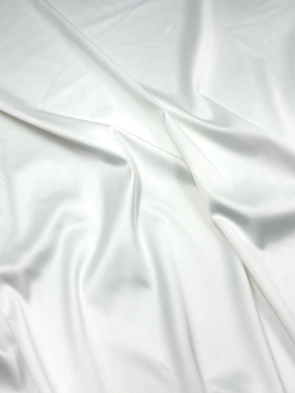 White stretch satin with glossy silky finish for lingerie sewing

