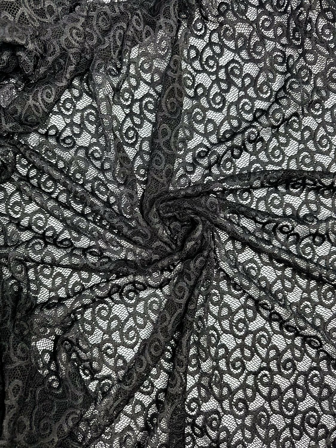 Tissu dentelle stretch noire à motif tourbillon, largeur 150cm (59.1")