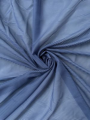 Microfibra a righe blu fiordaliso tono tenue
